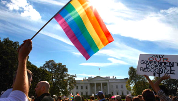 white house lit up in gay pride colors